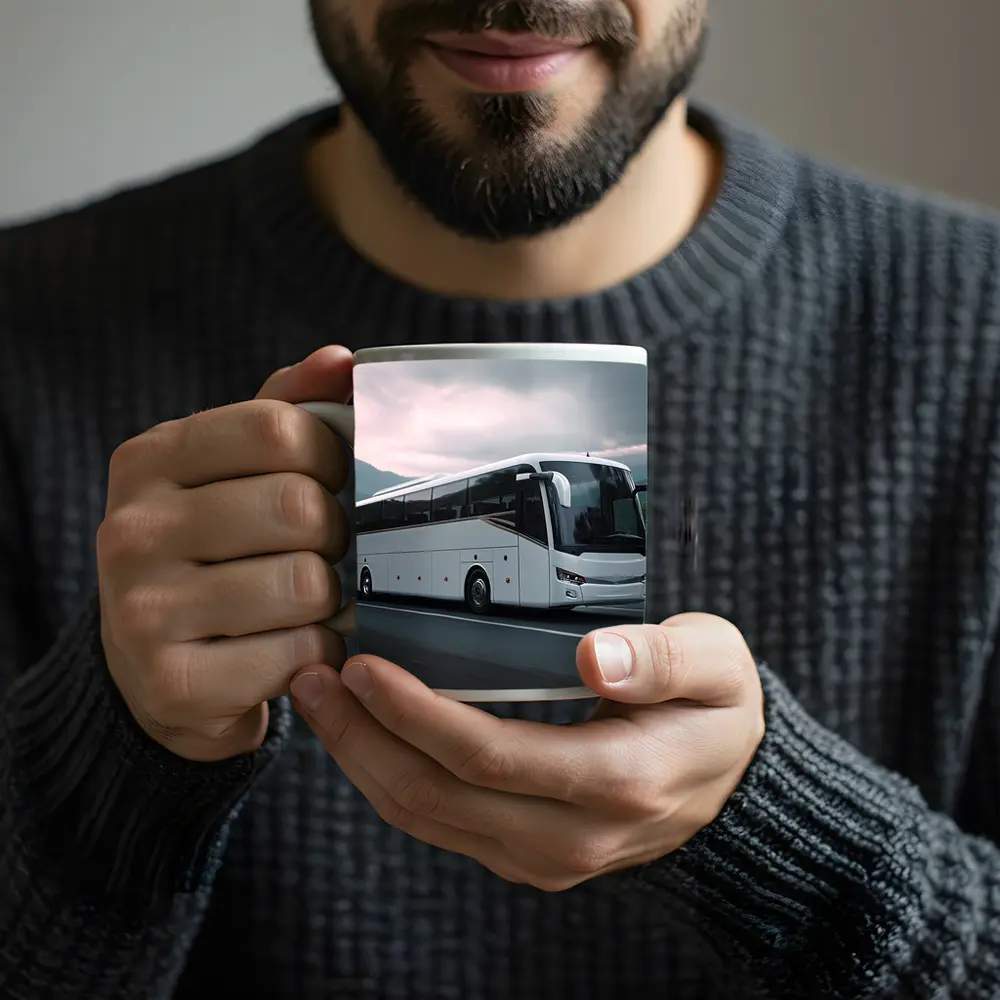 White Coach Bus Driving Through Mountain Road – Mugs