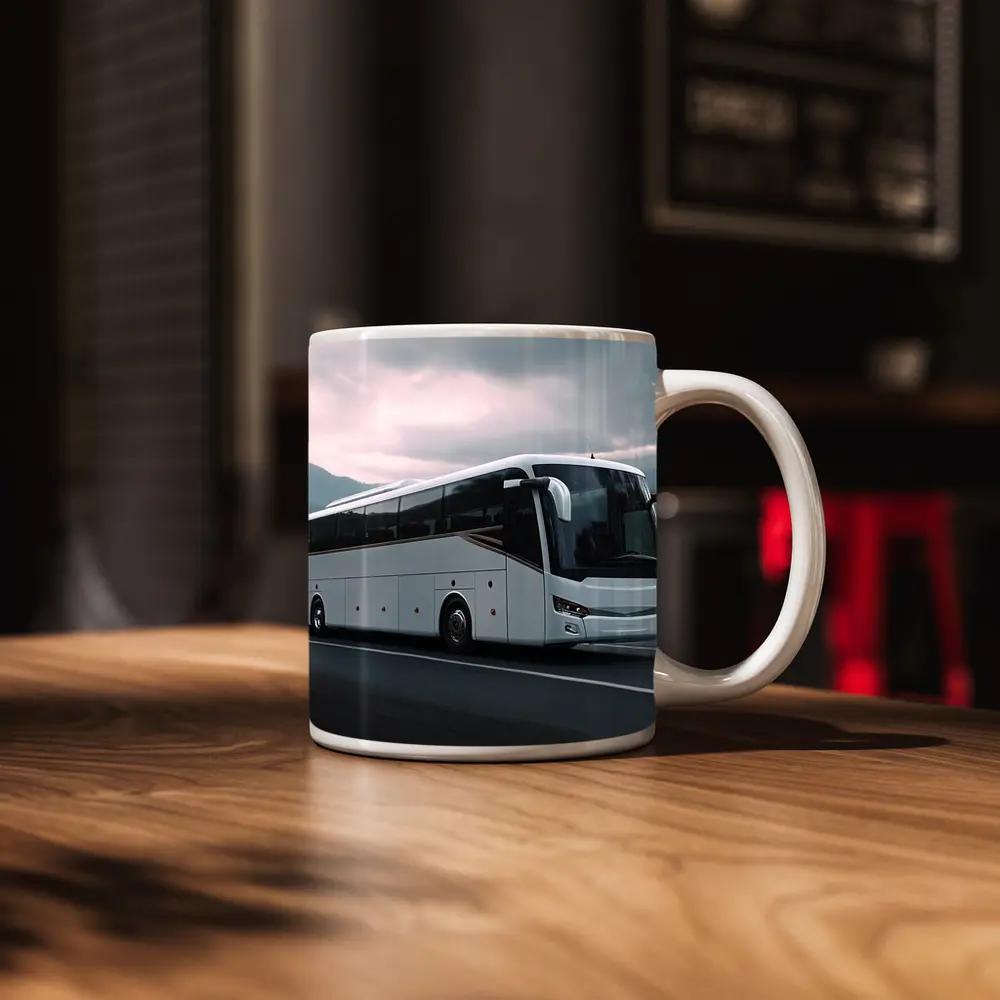 White Coach Bus Driving Through Mountain Road – Mugs