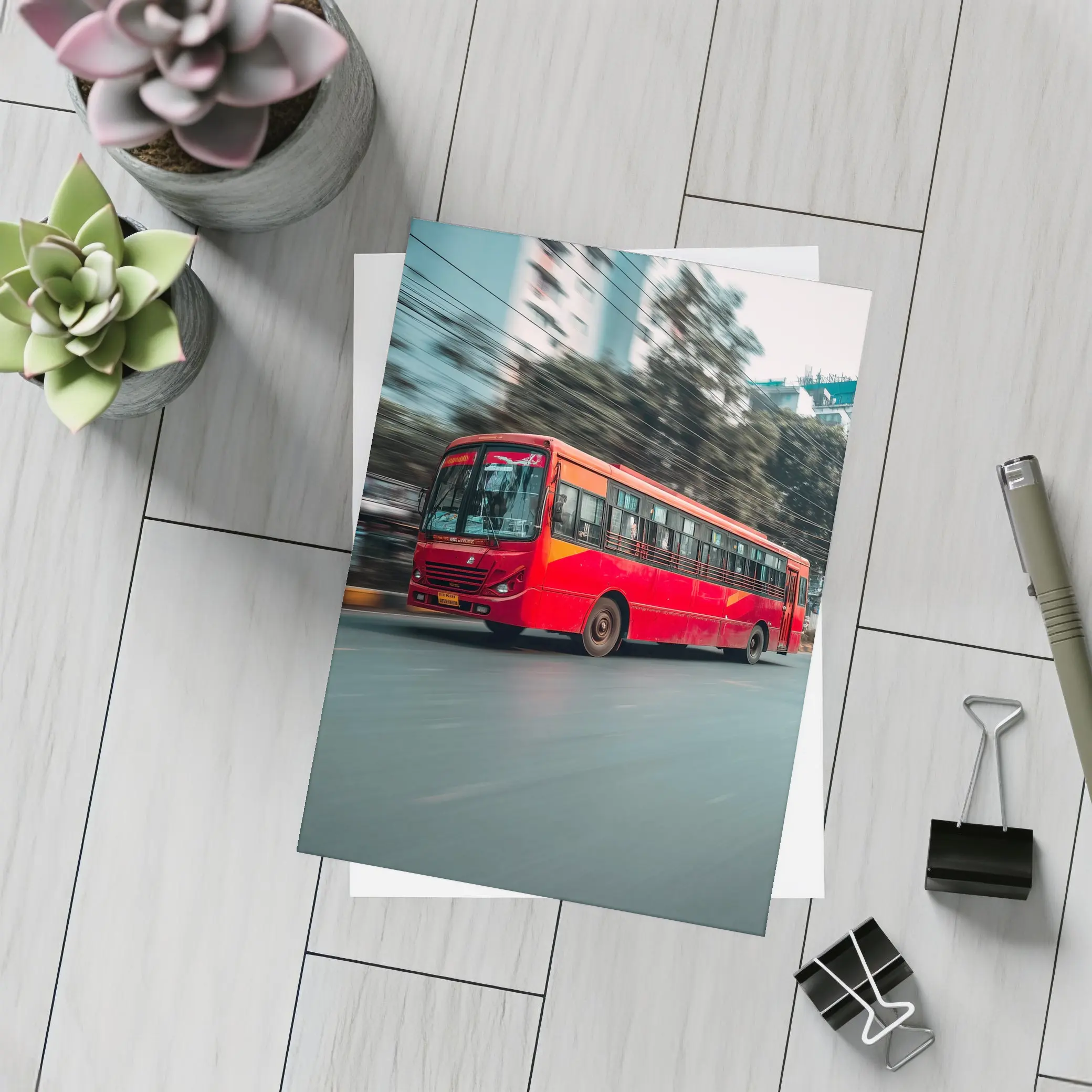 Red Bus Speeding Through Urban City Street – Postcards
