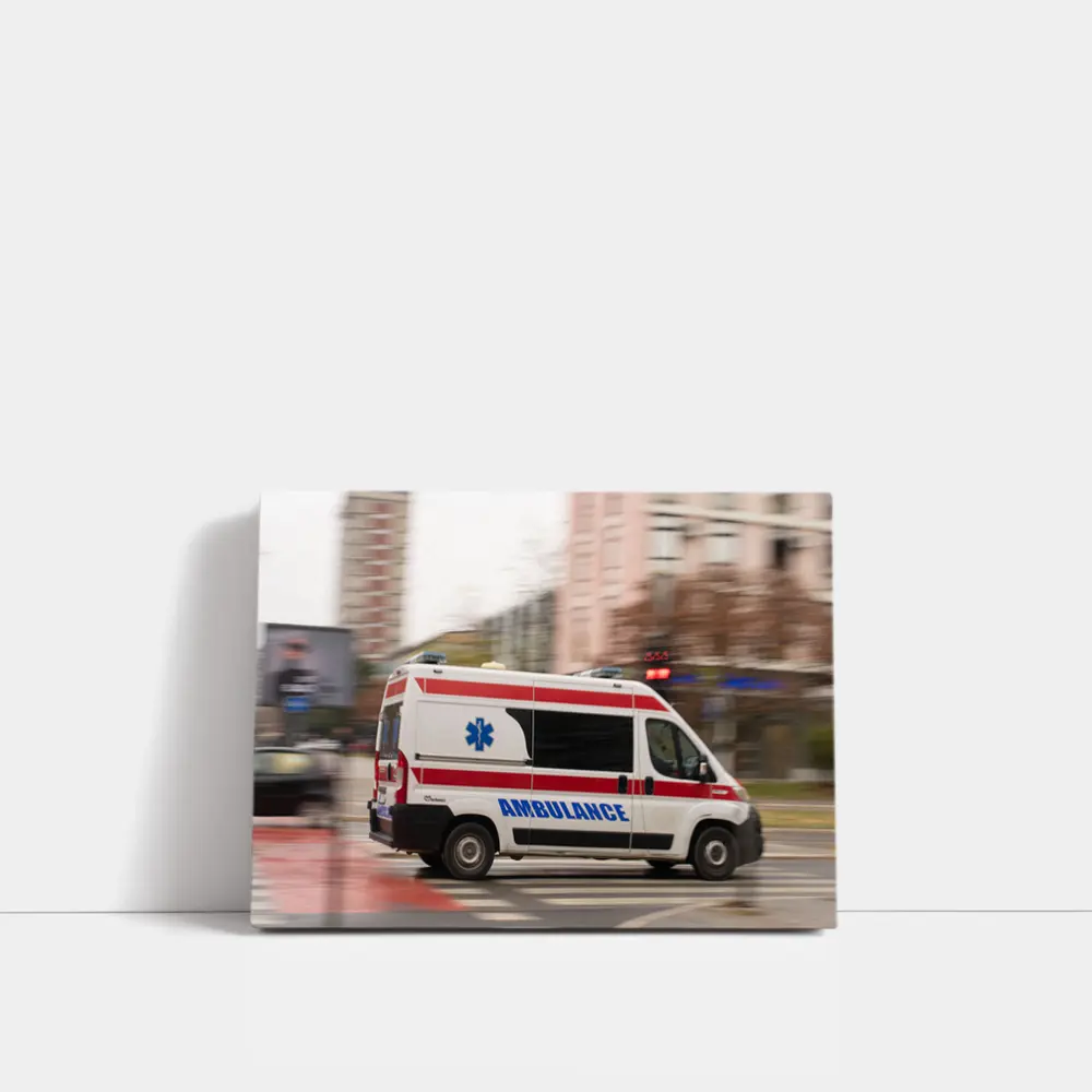 Ambulance Speeding Through City Street – Wall Art