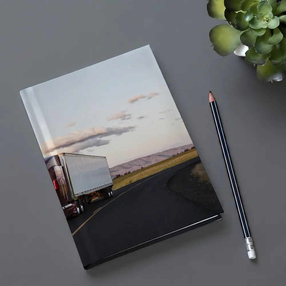 Red Semi Truck on Open Country Road – Notebooks