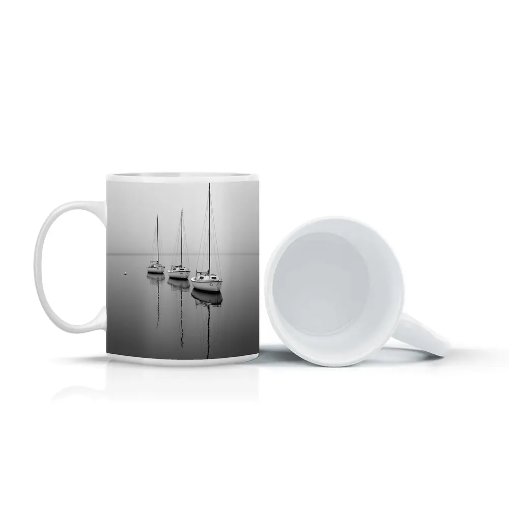 Three Sailboats Reflecting on Foggy Water – Mugs