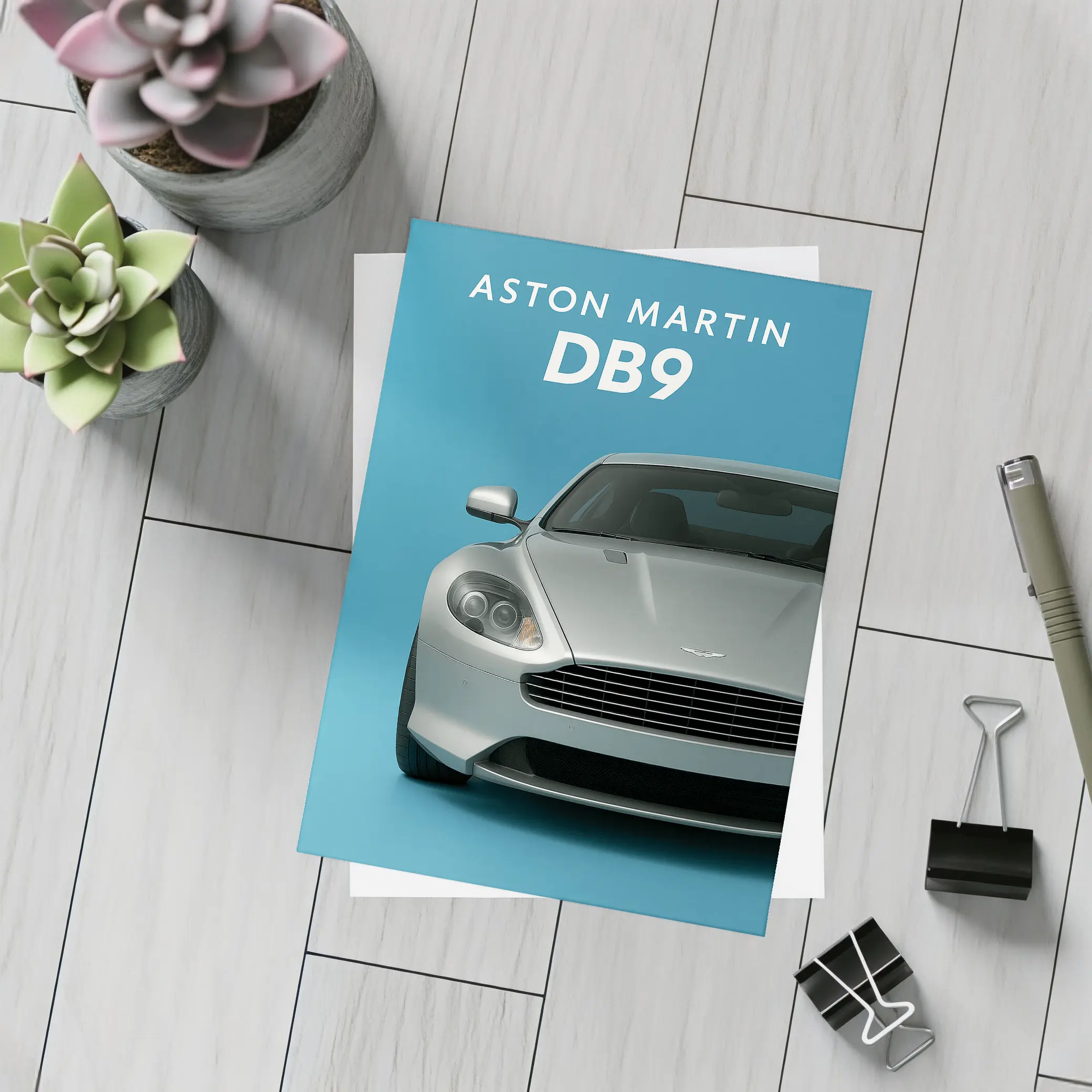 Aston Martin DB9 Silver Blue Background – Postcards