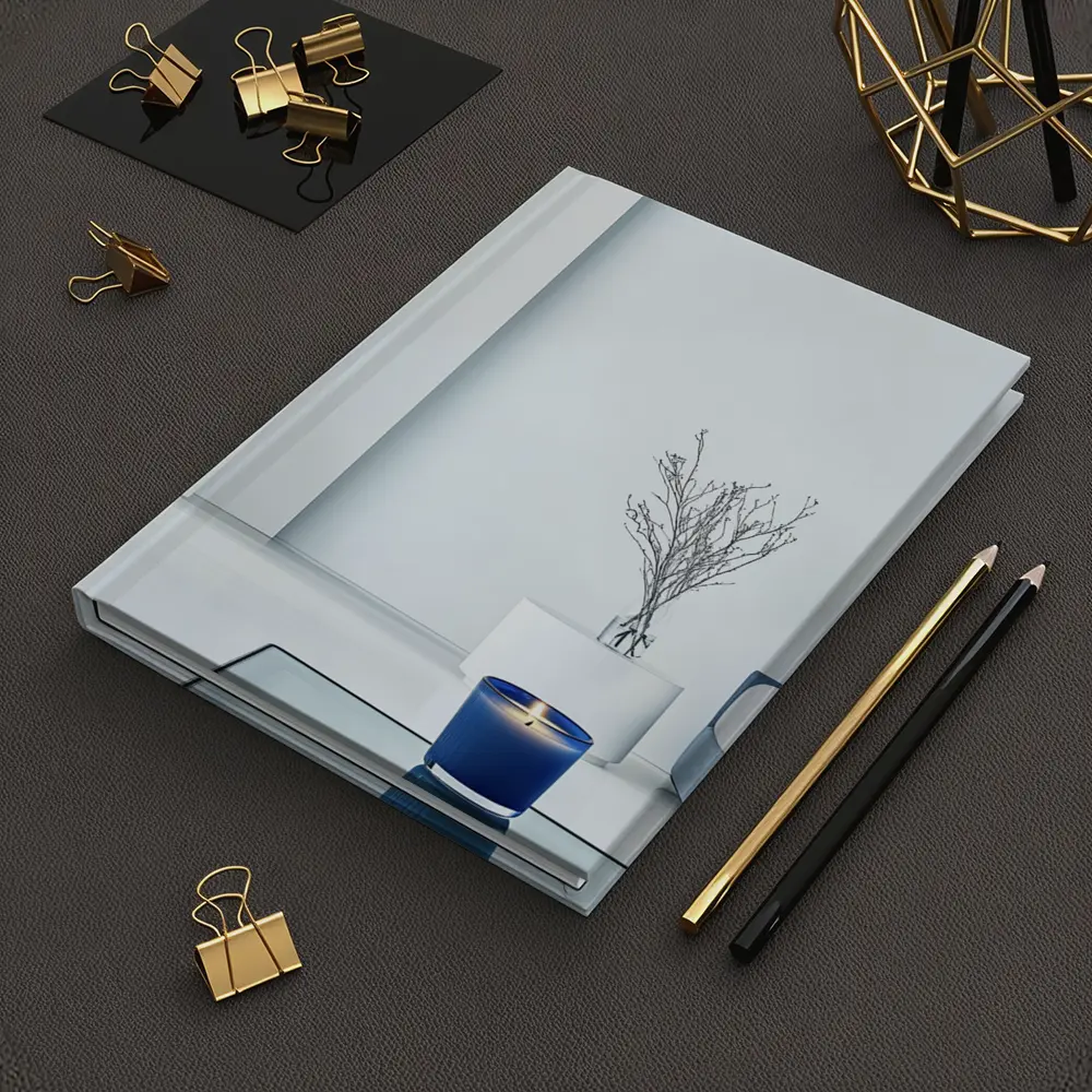 Blue Candle Glowing in Minimalist White Room – Notebooks