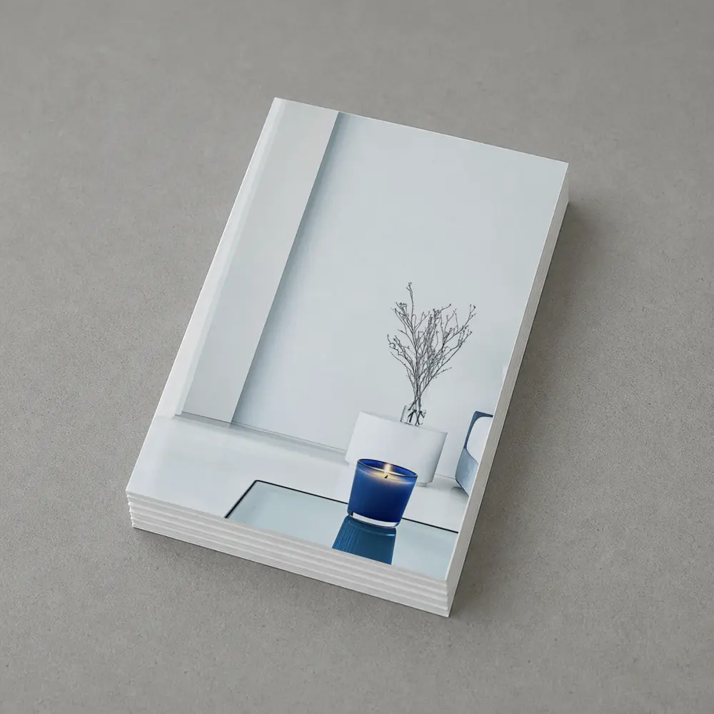 Blue Candle Glowing in Minimalist White Room – Postcards