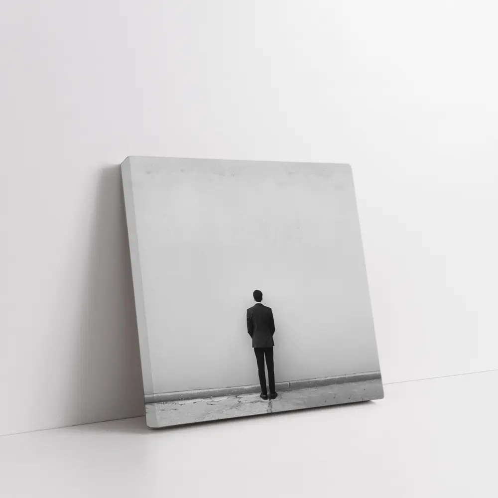 Man in Suit Standing Against White Wall – Wall Art