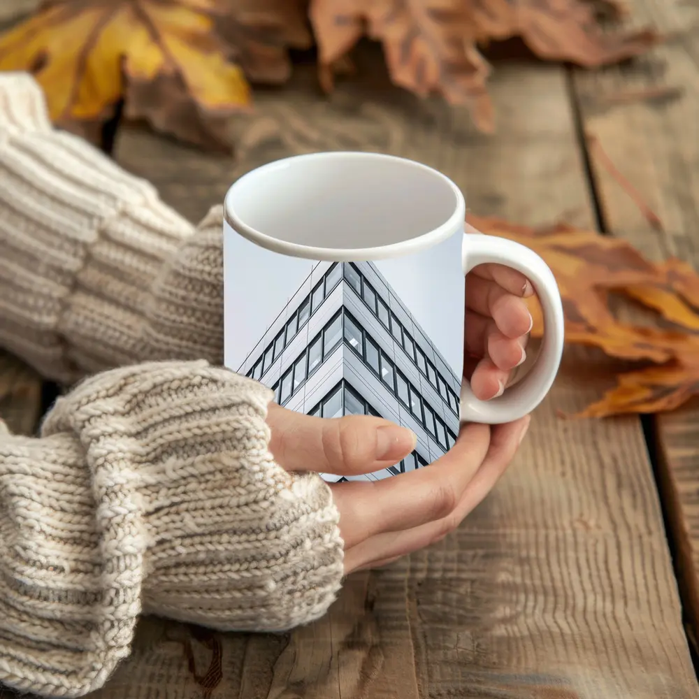 Modern Office Building Corner Against Gray Sky – Mugs