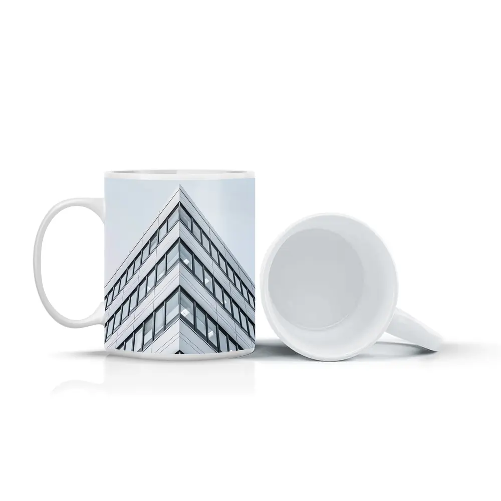 Modern Office Building Corner Against Gray Sky – Mugs