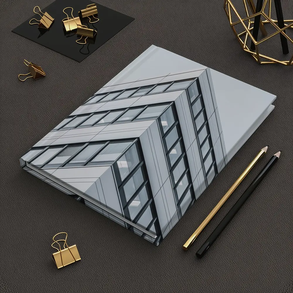 Modern Office Building Corner Against Gray Sky – Notebooks