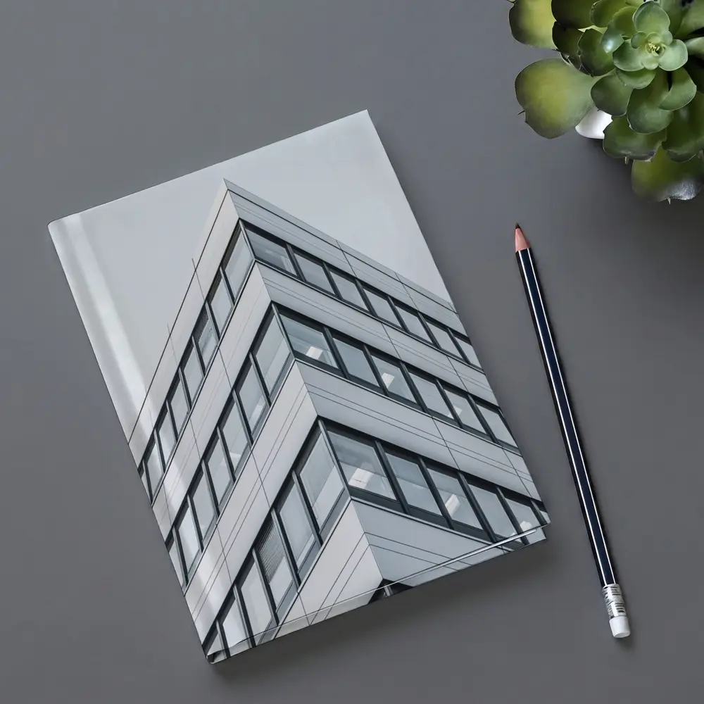 Modern Office Building Corner Against Gray Sky – Notebooks