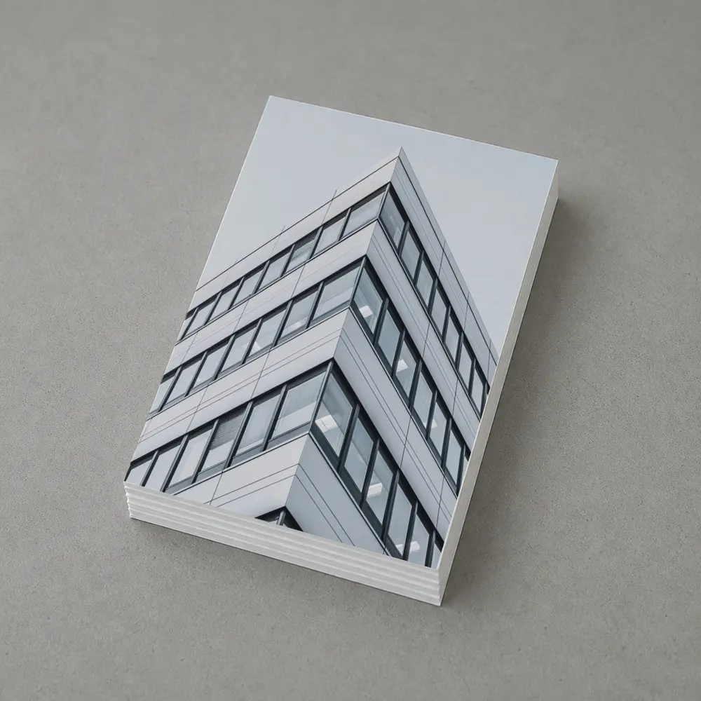 Modern Office Building Corner Against Gray Sky – Postcards