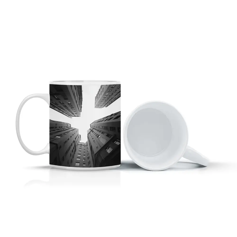Looking Up Between Gray City Buildings – Mugs