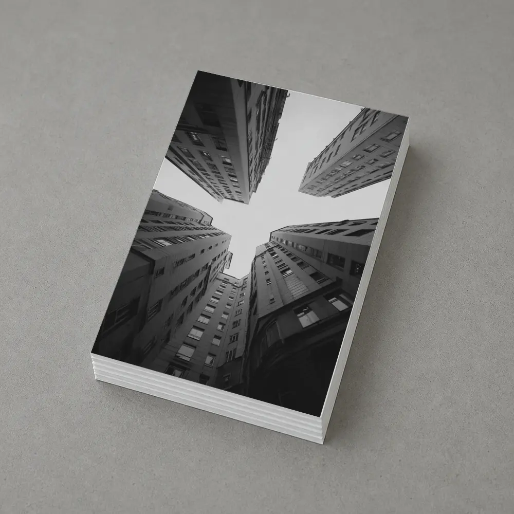 Looking Up Between Gray City Buildings – Postcards