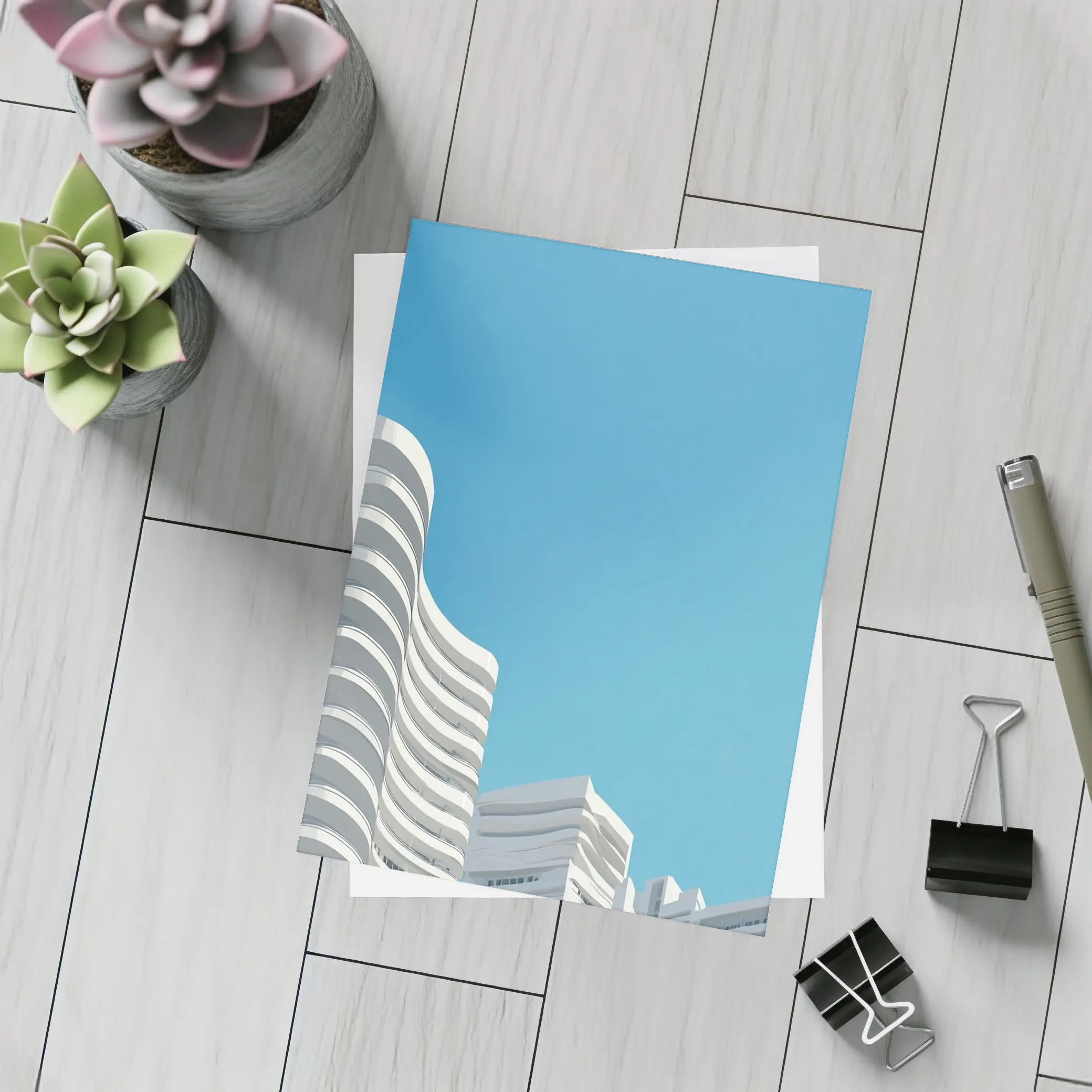 White Curved Buildings Against Blue Sky – Postcards