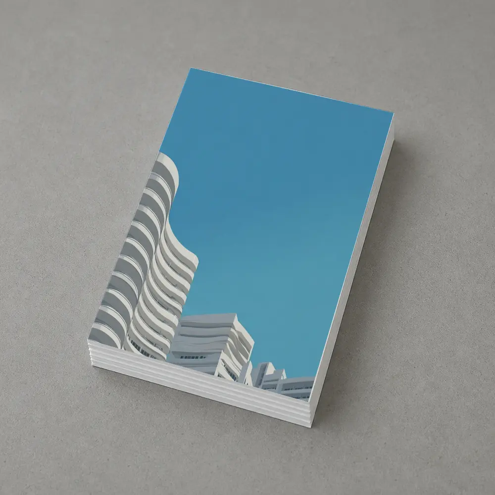 White Curved Buildings Against Blue Sky – Postcards