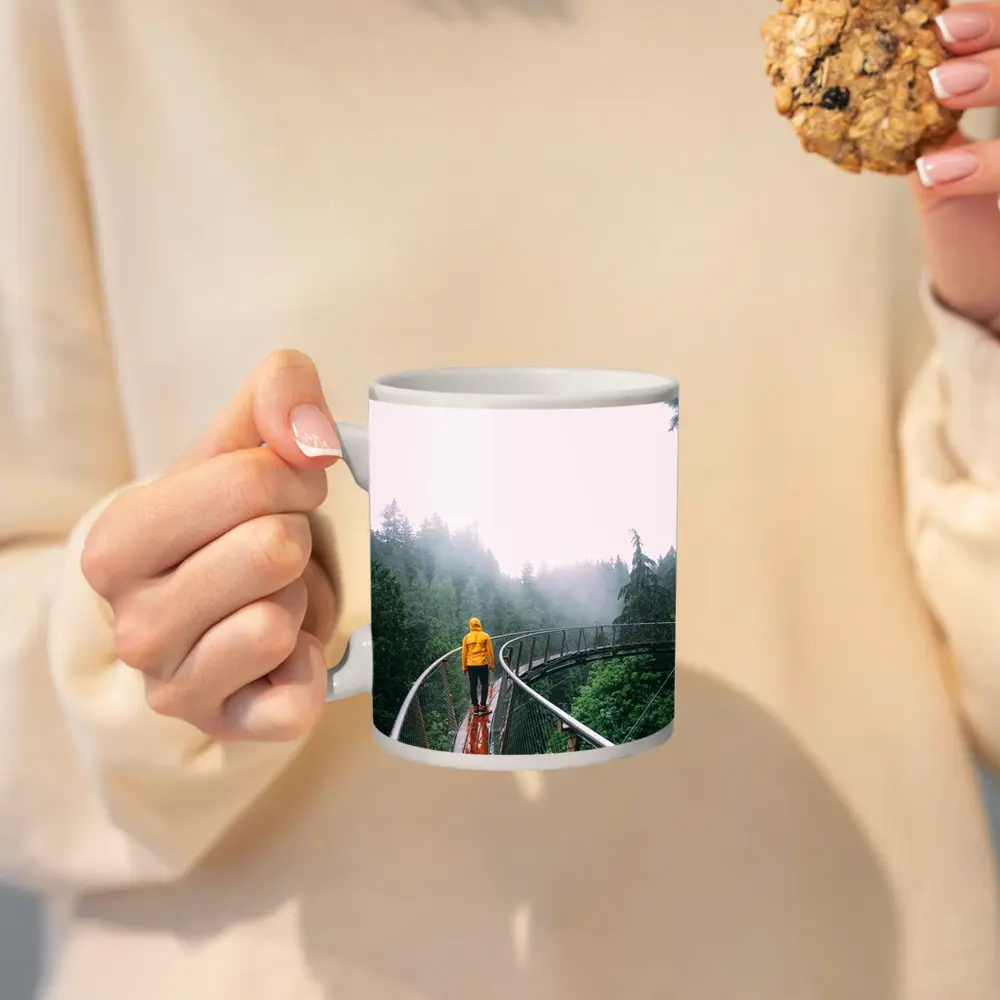 Yellow Jacket Hiker on Misty Forest Bridge – Mugs
