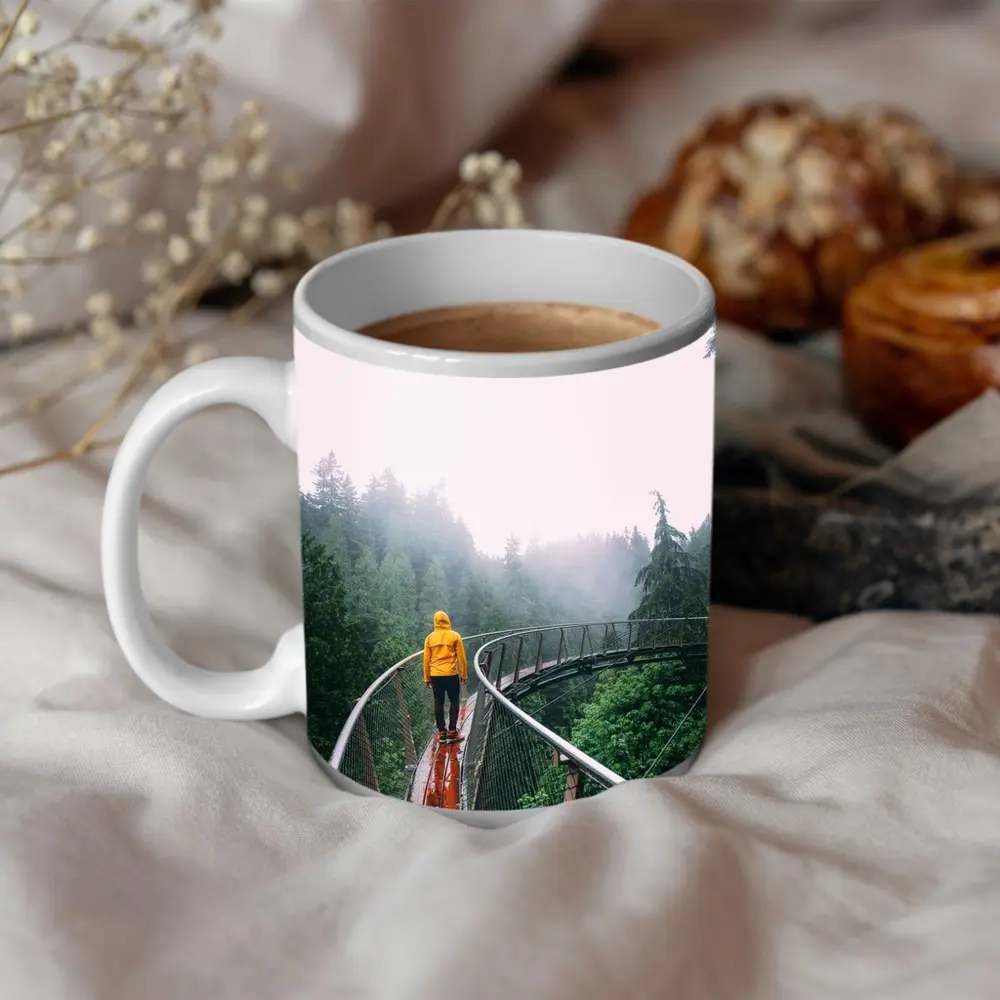 Yellow Jacket Hiker on Misty Forest Bridge – Mugs