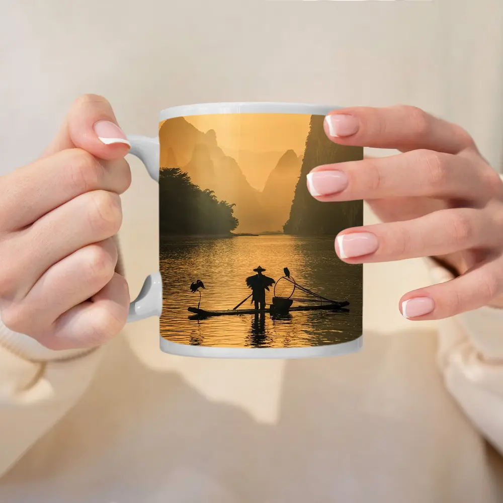 Fisherman on Bamboo Raft Li River – Mugs
