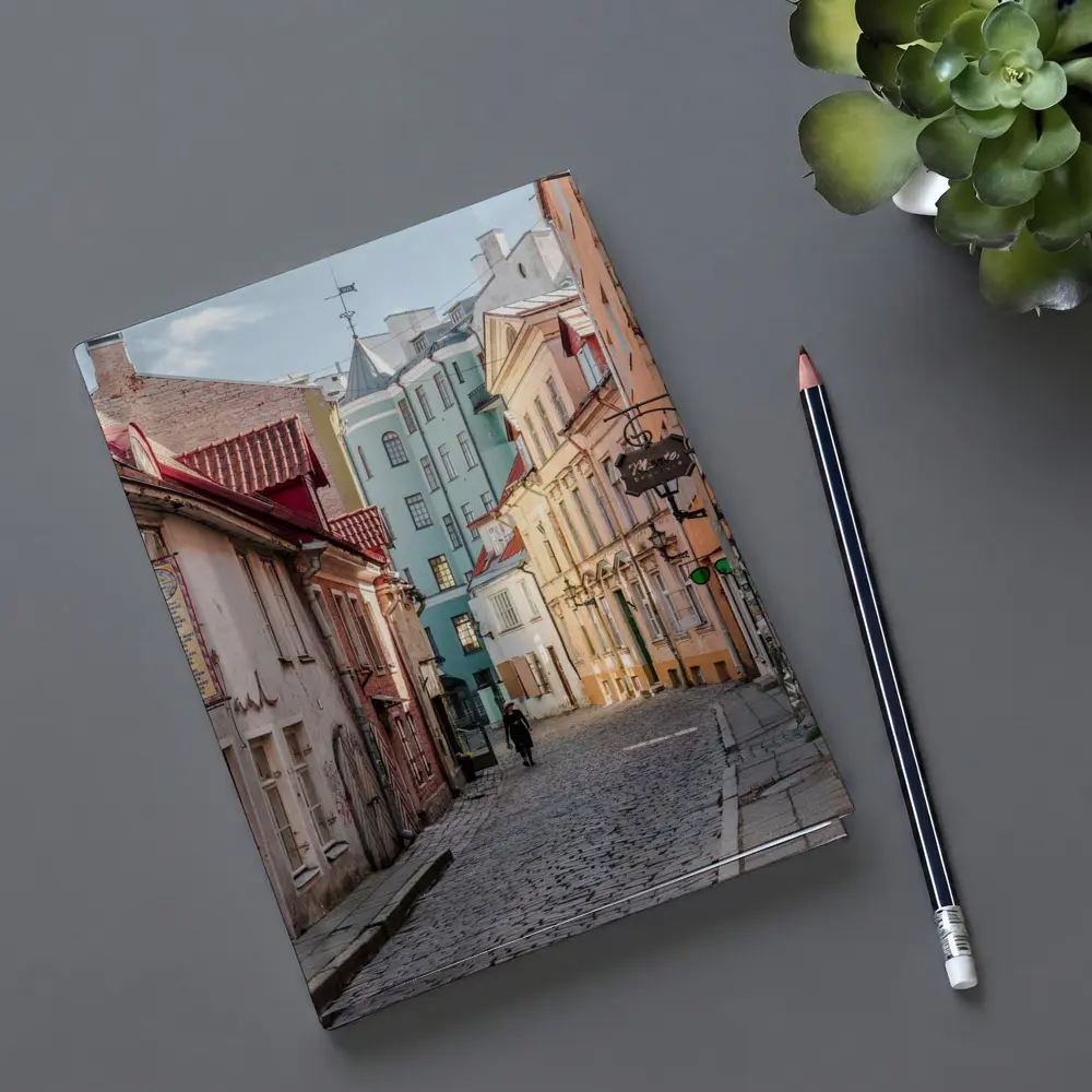 Old Town Cobblestone Street Pastel Buildings – Notebooks
