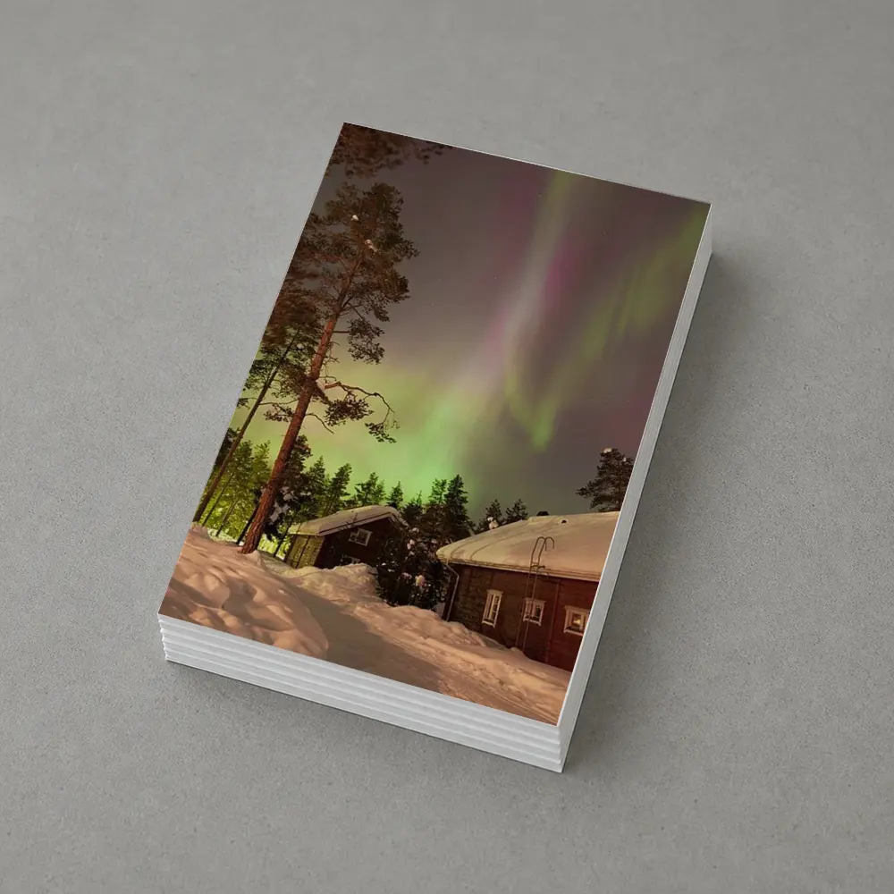Northern Lights Over Snowy Winter Cabins – Postcards