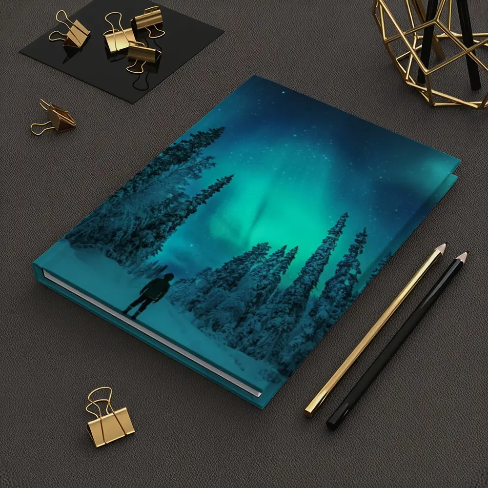 Person Standing Under Northern Lights Winter Forest – Notebooks