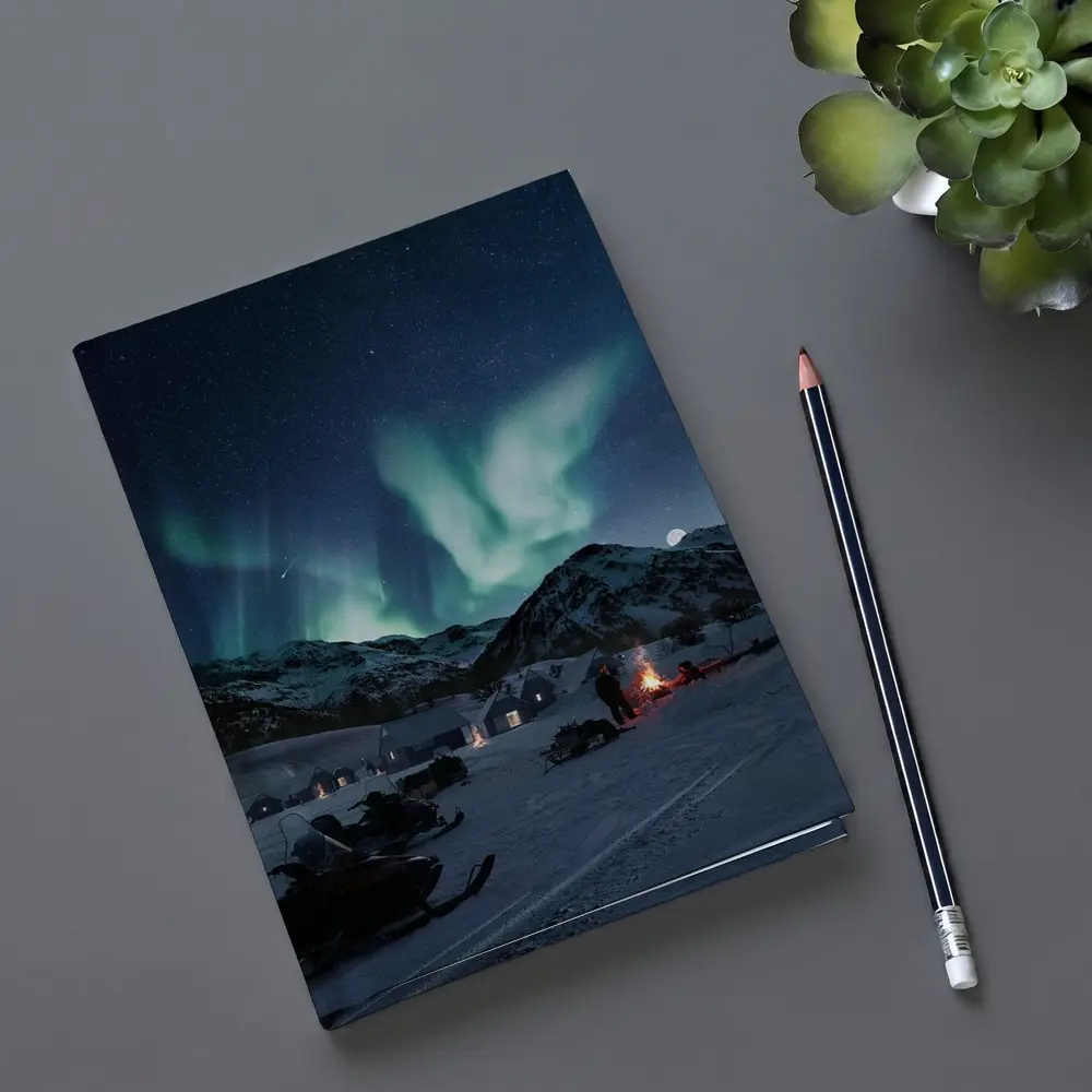Northern Lights Over Snowy Mountain Village – Notebooks