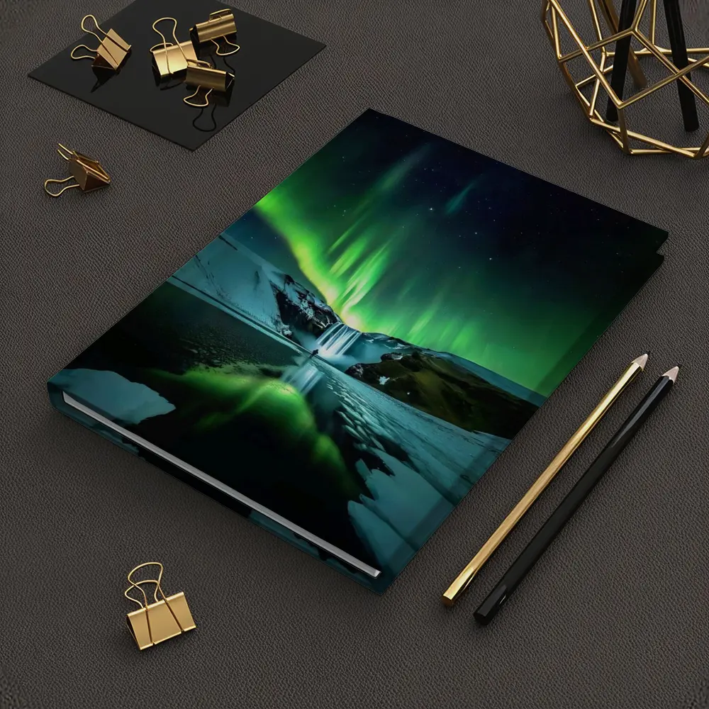 Northern Lights Over Snowy Waterfall Iceland – Notebooks
