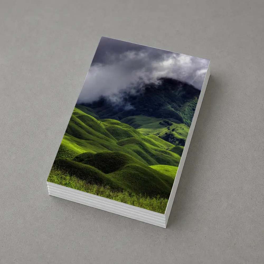 Green Rolling Hills Storm Clouds Mountains – Postcards