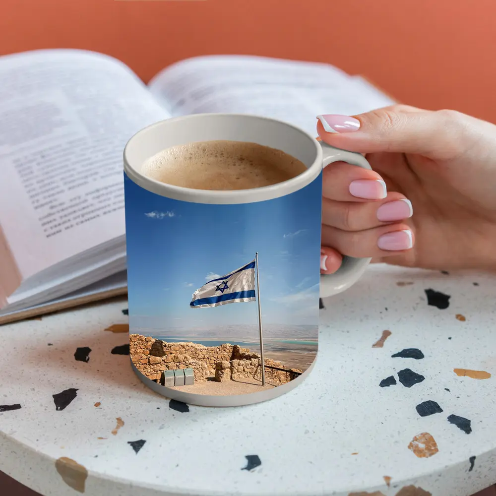 Israel Flag Flying Over Masada Desert – Mugs