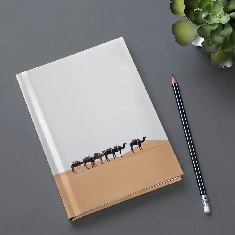 Camel Caravan Walking Across Desert Dunes – Notebooks
