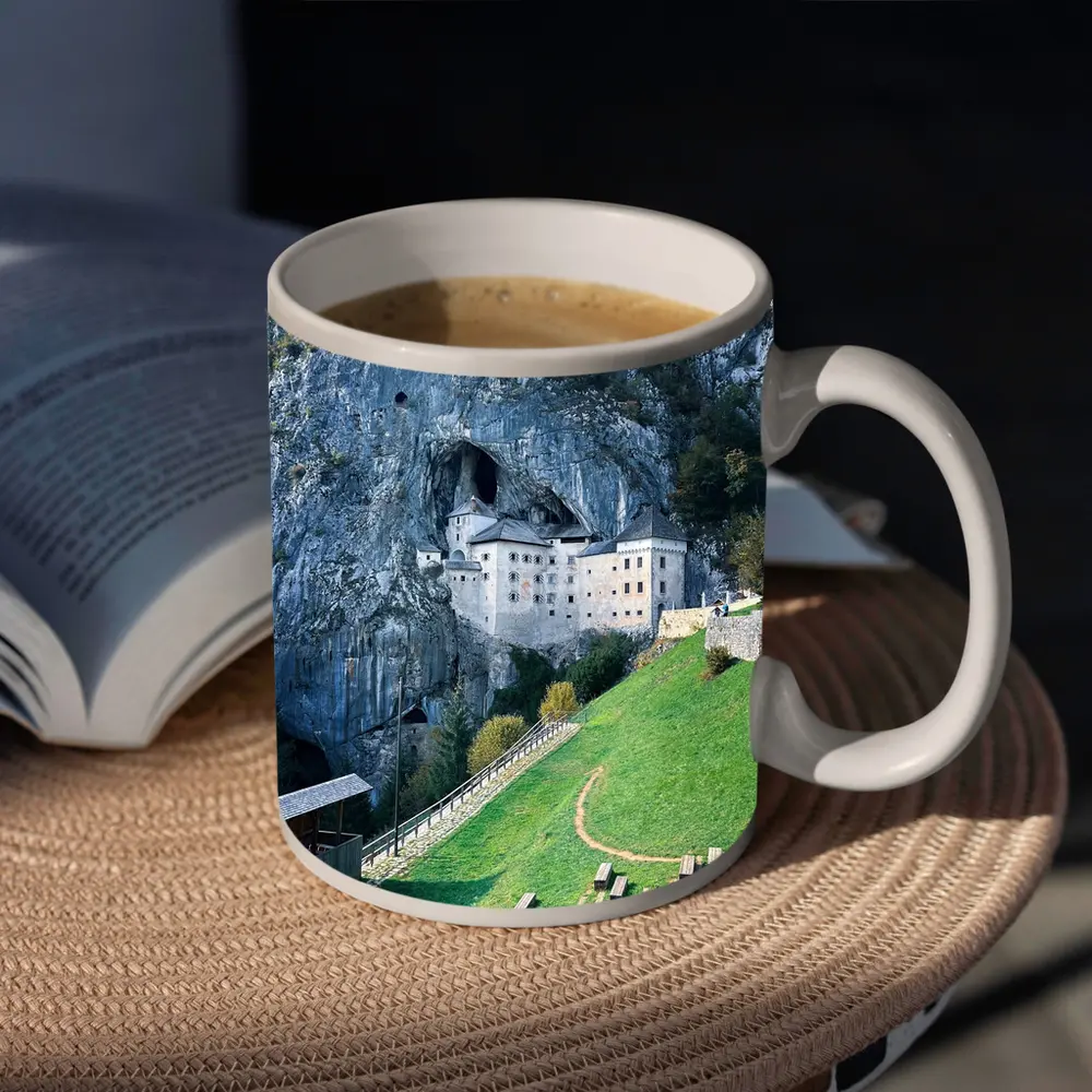 Predjama Castle Built Into Rocky Cliff – Mugs