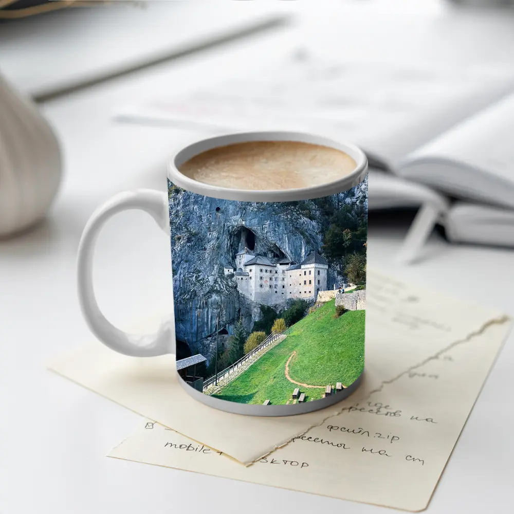Predjama Castle Built Into Rocky Cliff – Mugs