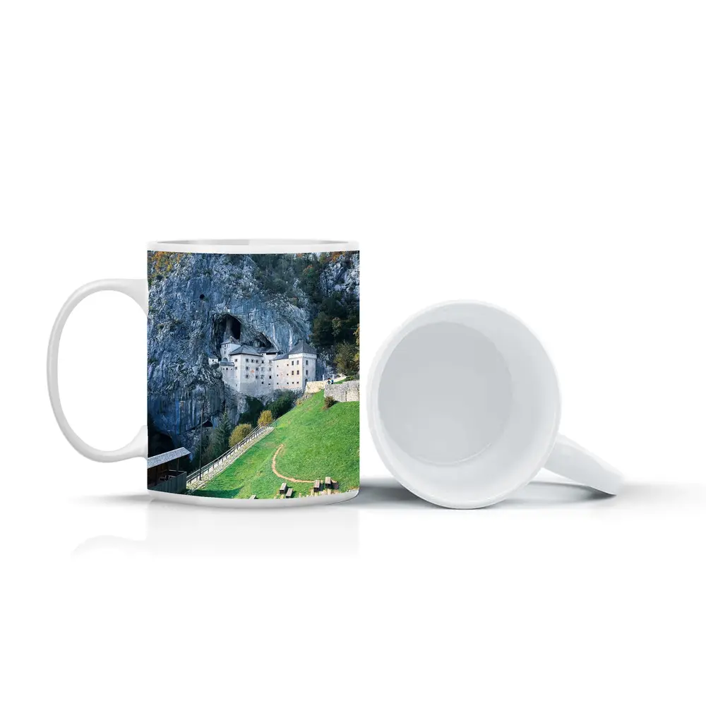 Predjama Castle Built Into Rocky Cliff – Mugs