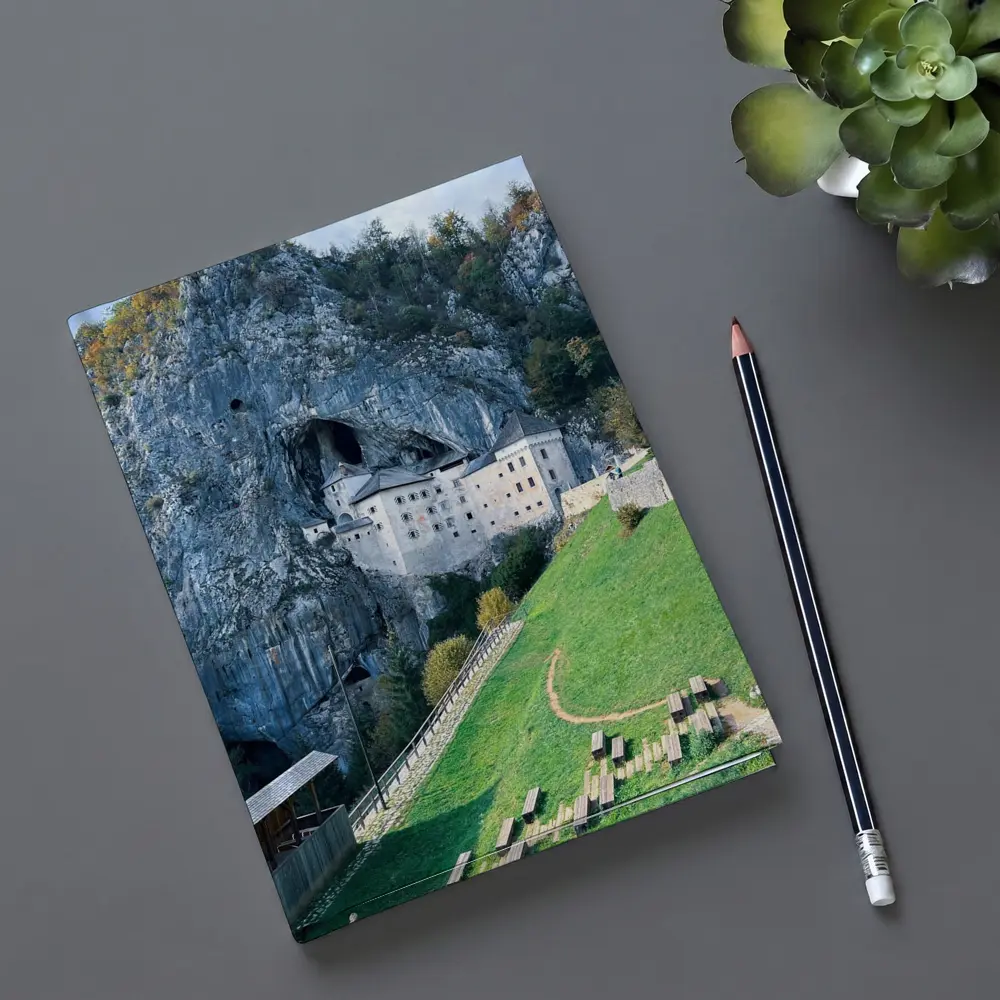 Predjama Castle Built Into Rocky Cliff – Notebooks