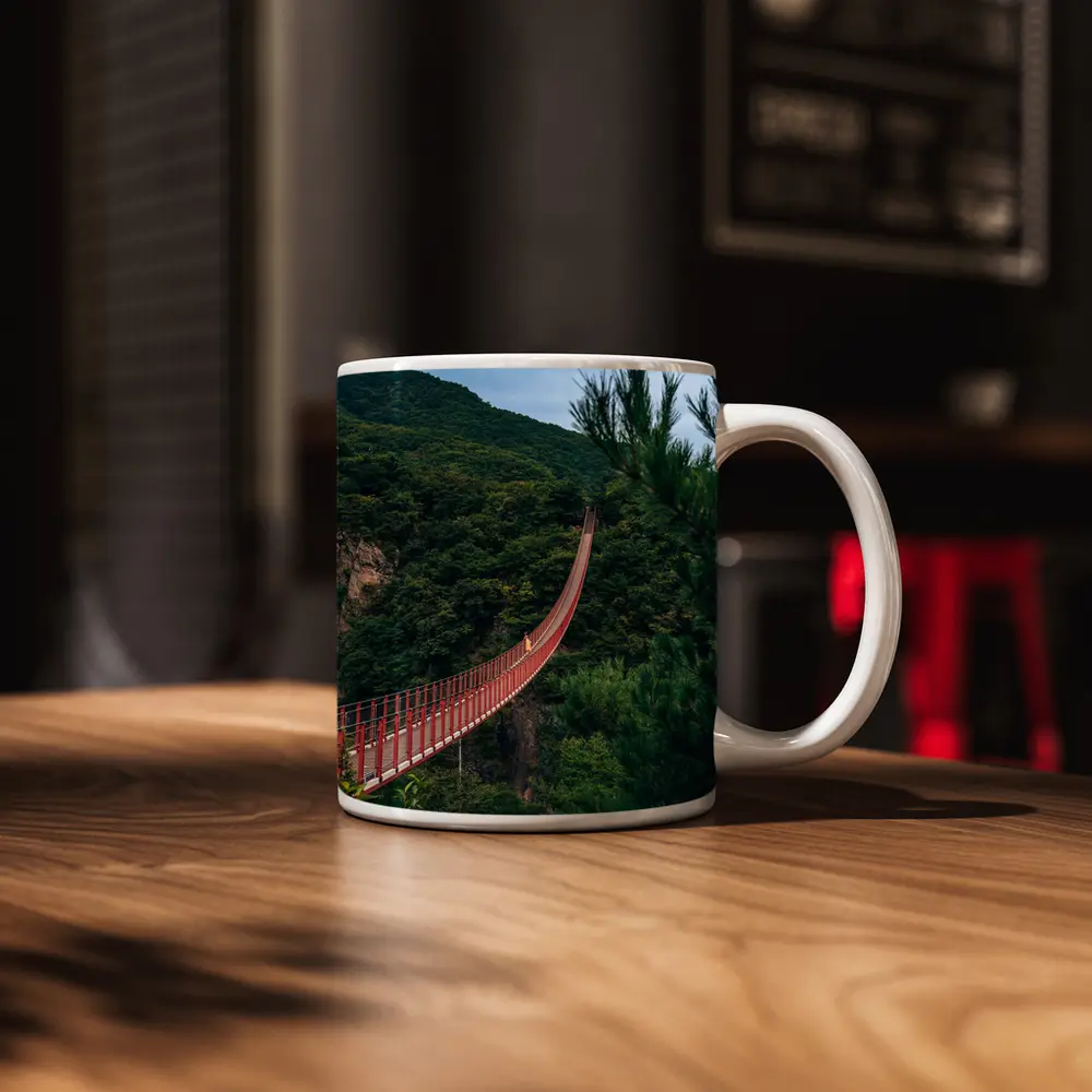 Red Suspension Bridge Green Mountain Forest – Mugs