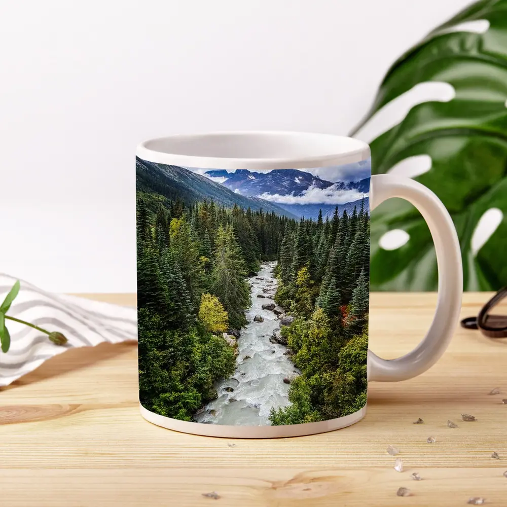 Rocky Mountain River Through Pine Forest – Mugs