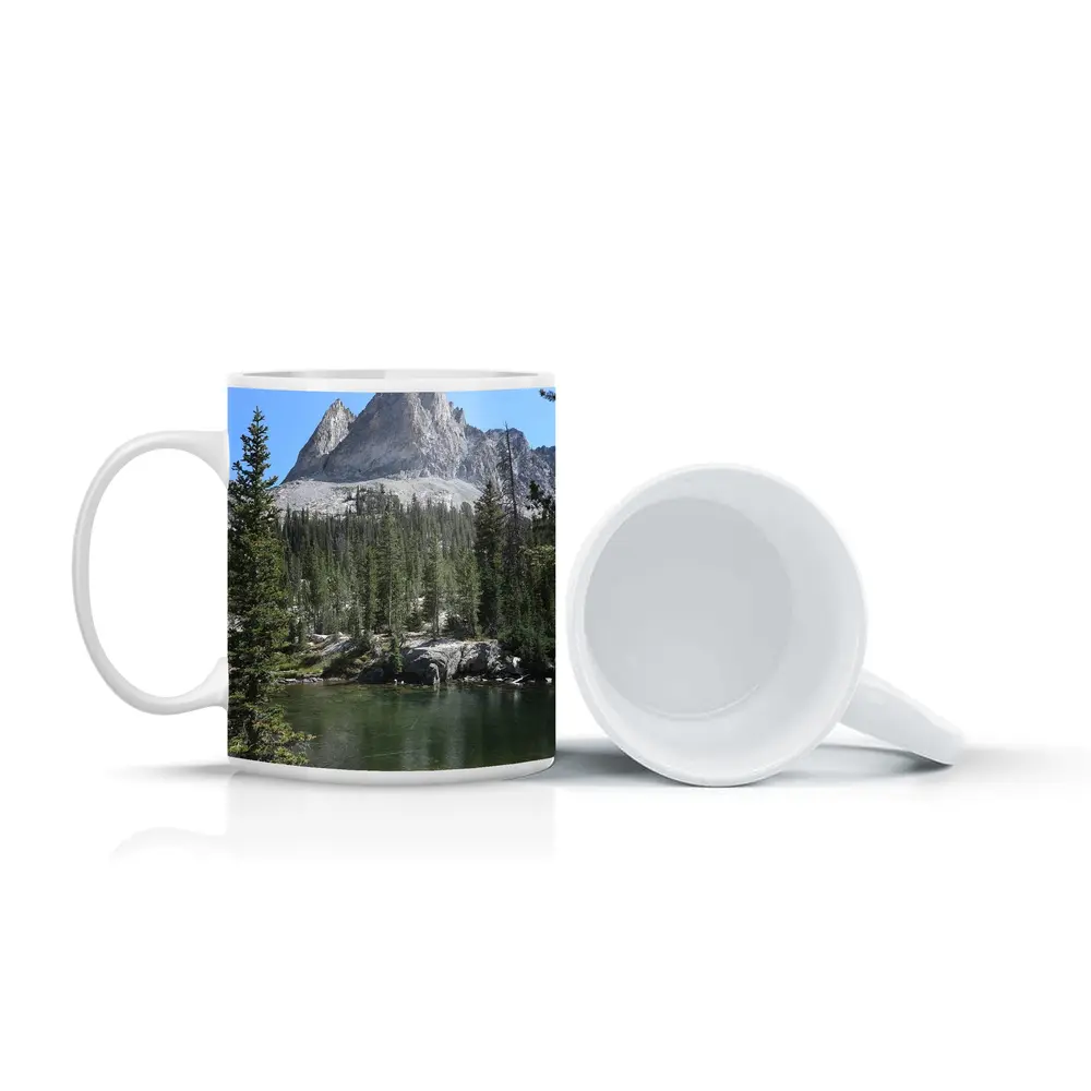 Rocky Mountain Peak Above Alpine Lake – Mugs
