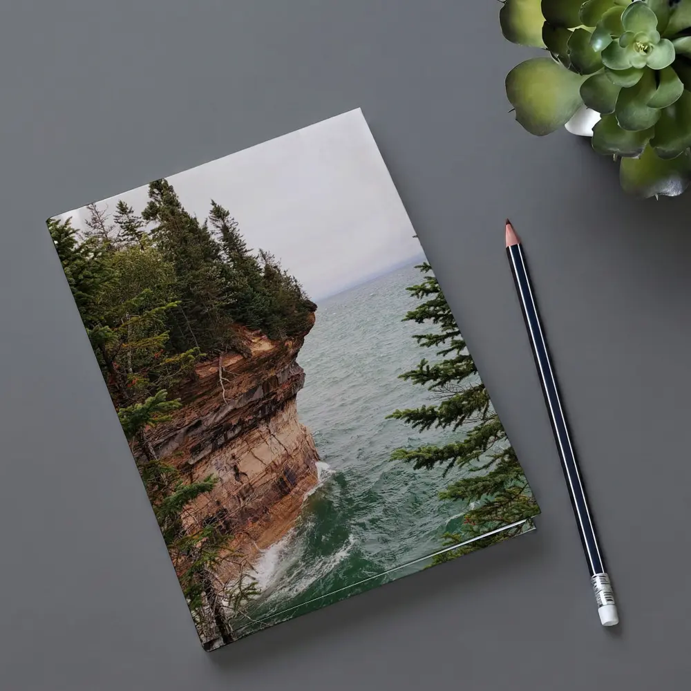 Red Sandstone Cliff Above Teal Lake – Notebooks