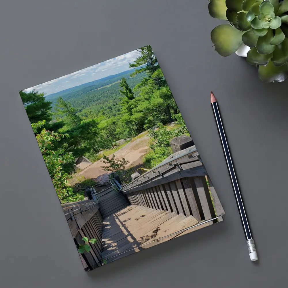 Wooden Staircase Overlooking Vast Forest Landscape – Notebooks