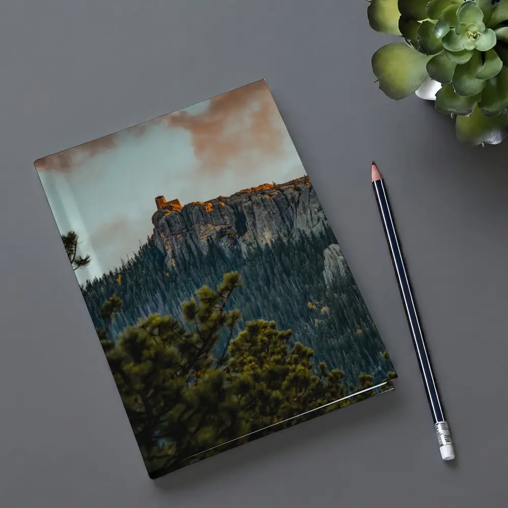Stone Watchtower Atop Rocky Mountain Cliff – Notebooks