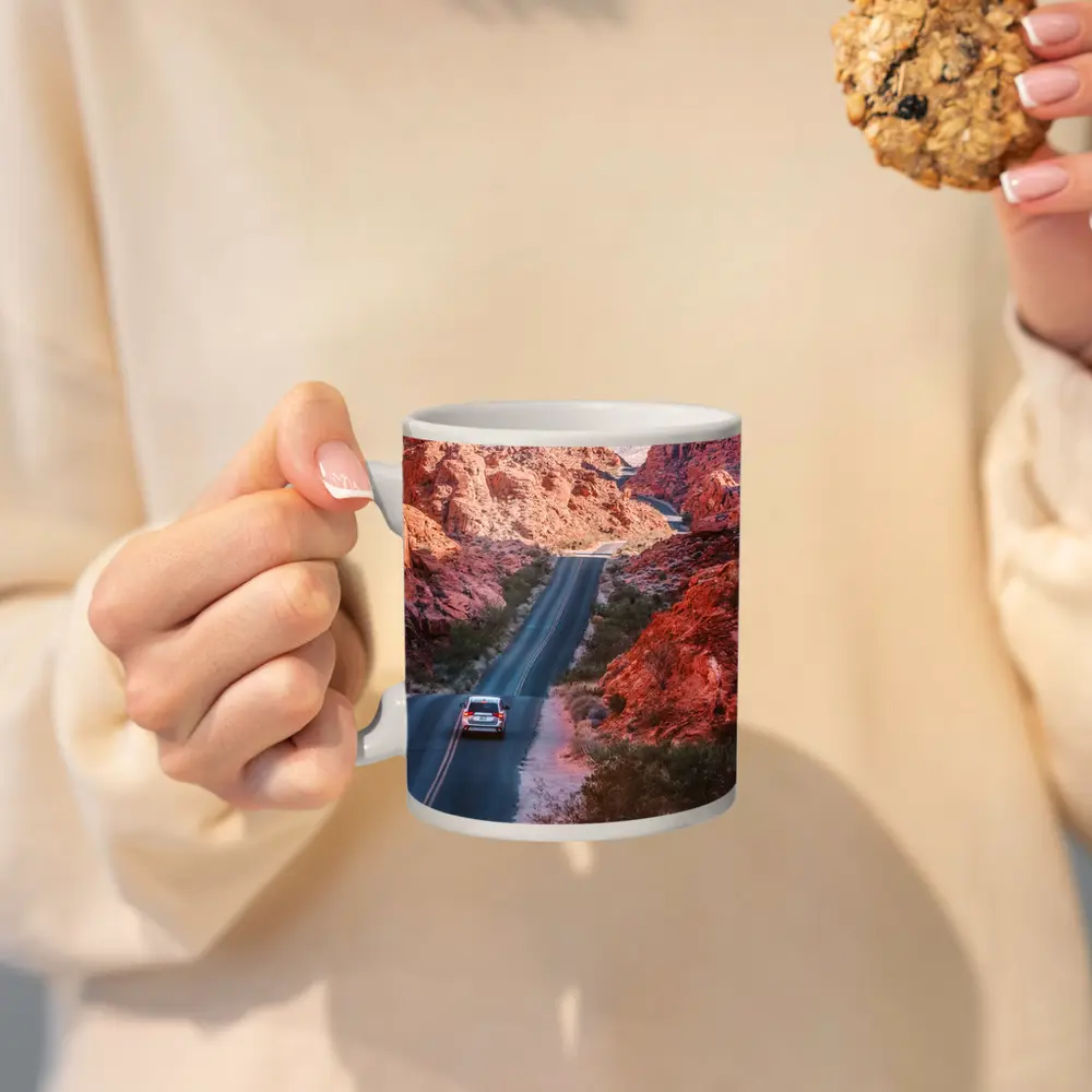 SUV Driving Through Red Rock Canyon Road – Mugs