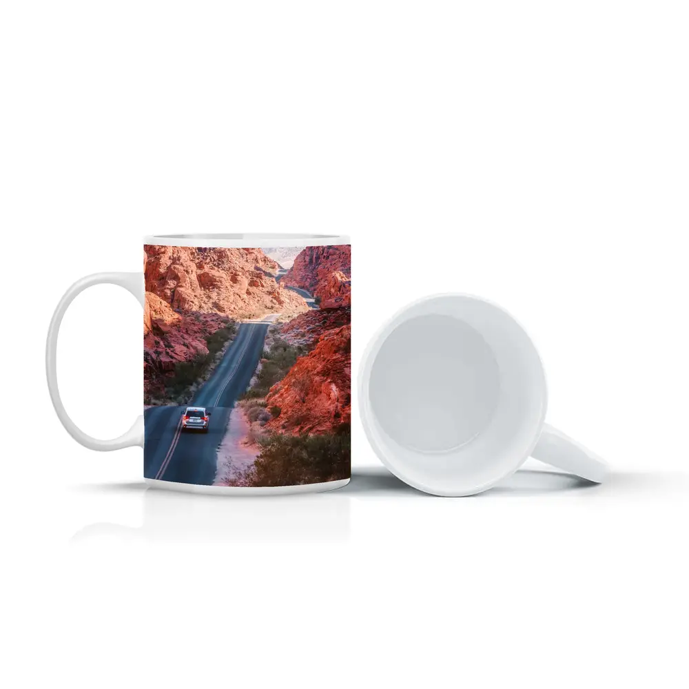 SUV Driving Through Red Rock Canyon Road – Mugs