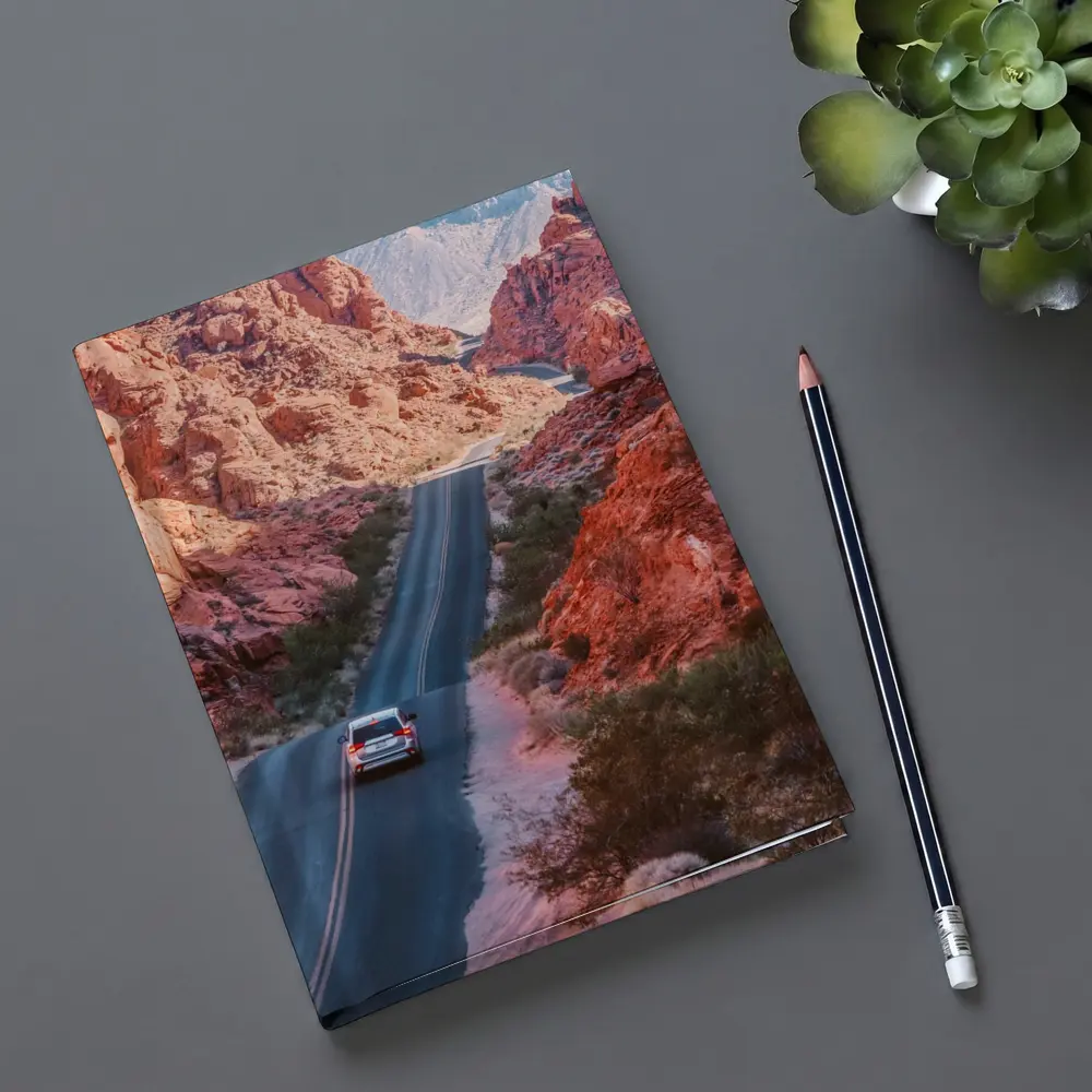SUV Driving Through Red Rock Canyon Road – Notebooks