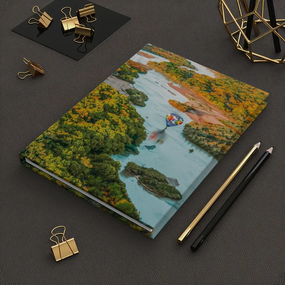 Hot Air Balloon Over Autumn River Landscape – Notebooks