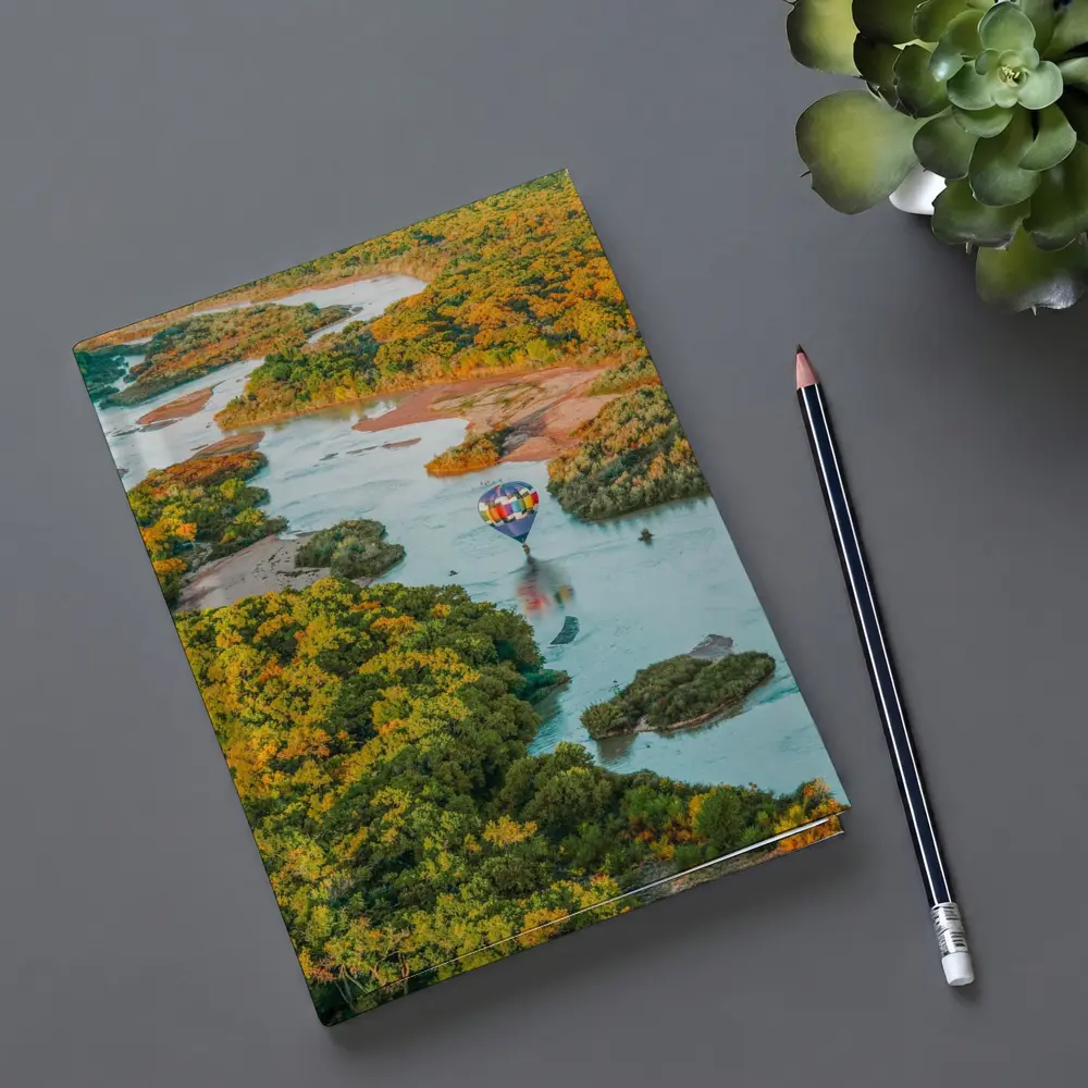 Hot Air Balloon Over Autumn River Landscape – Notebooks