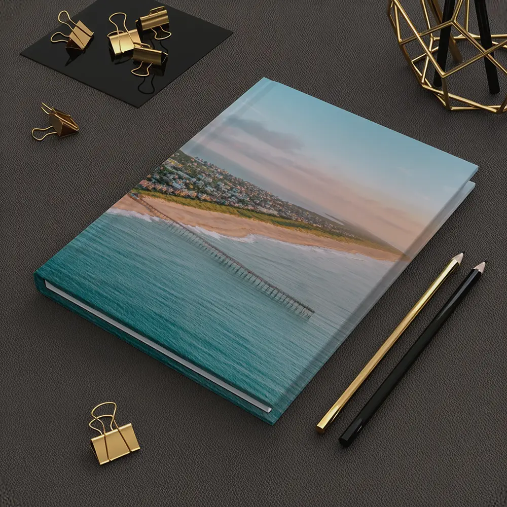 Aerial Beach Pier Coastal Town Sunset View – Notebooks