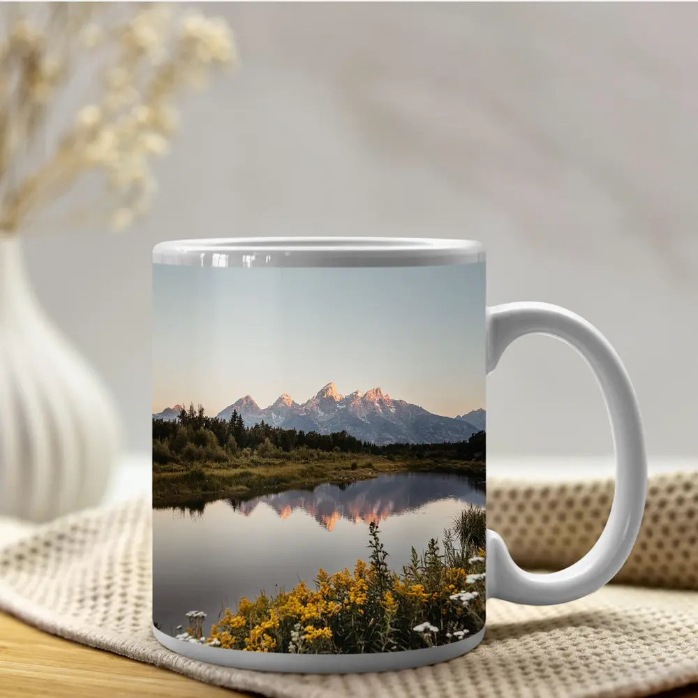 Grand Teton Mountains Reflected in Calm Lake – Mugs