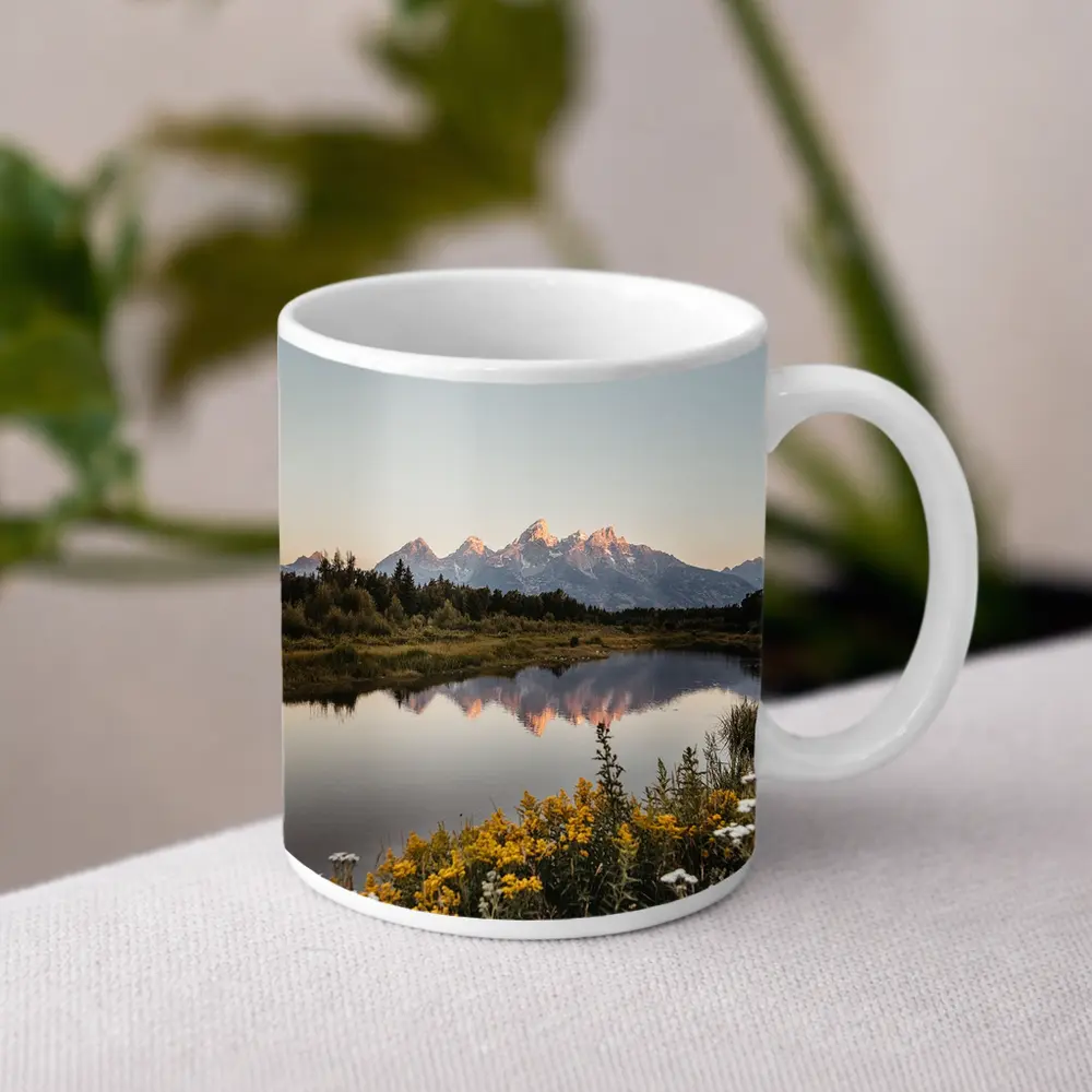 Grand Teton Mountains Reflected in Calm Lake – Mugs