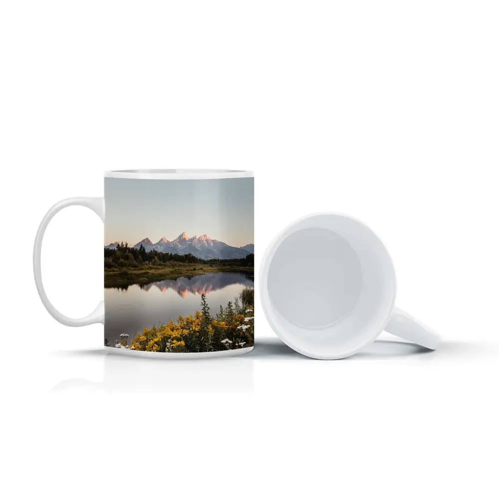 Grand Teton Mountains Reflected in Calm Lake – Mugs