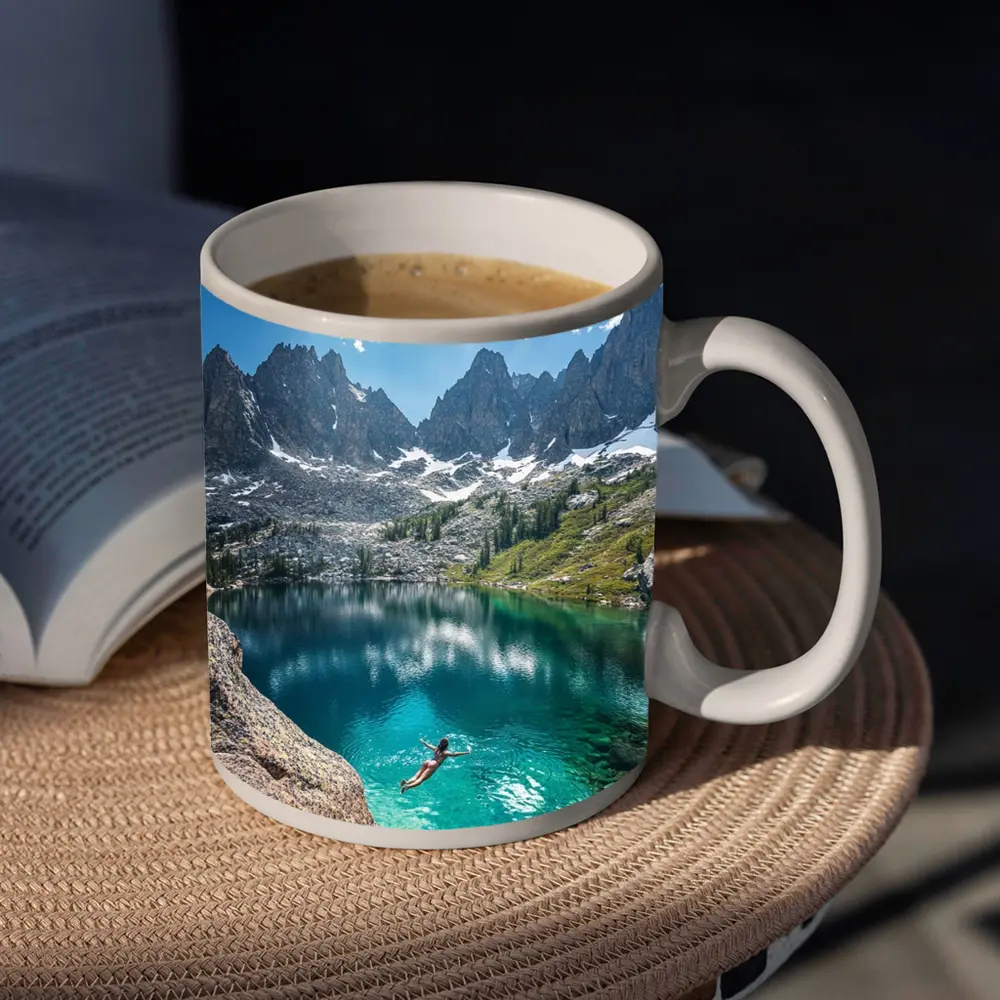 Person Swimming Alpine Lake Jagged Mountain Peaks – Mugs